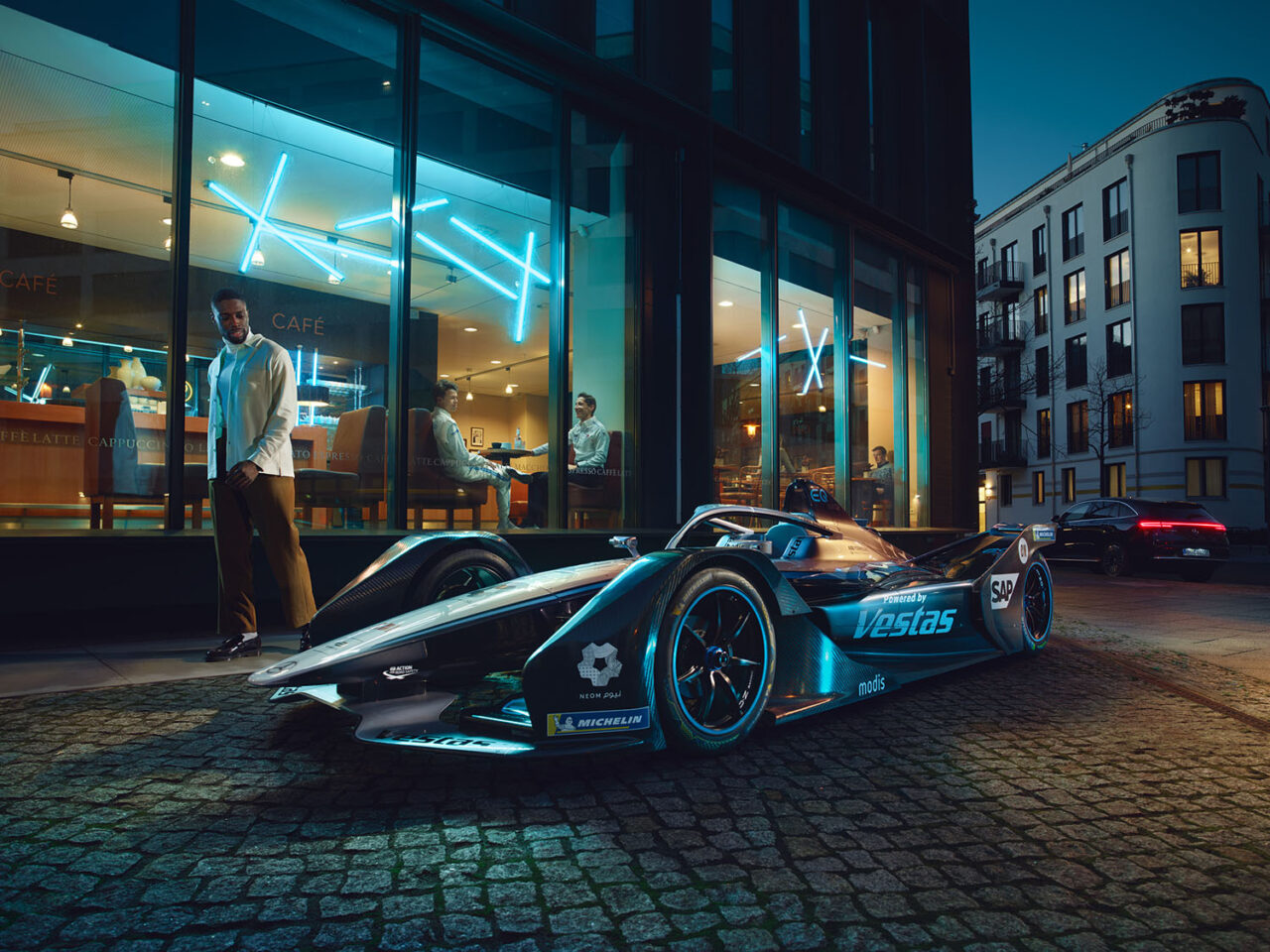 Mercedes Benz x Formel E collaboration featuring dynamic photography by Anke Luckmann and styling by Alexandra Heckel. High-energy campaign showcasing cutting-edge automotive design and stylish racewear.