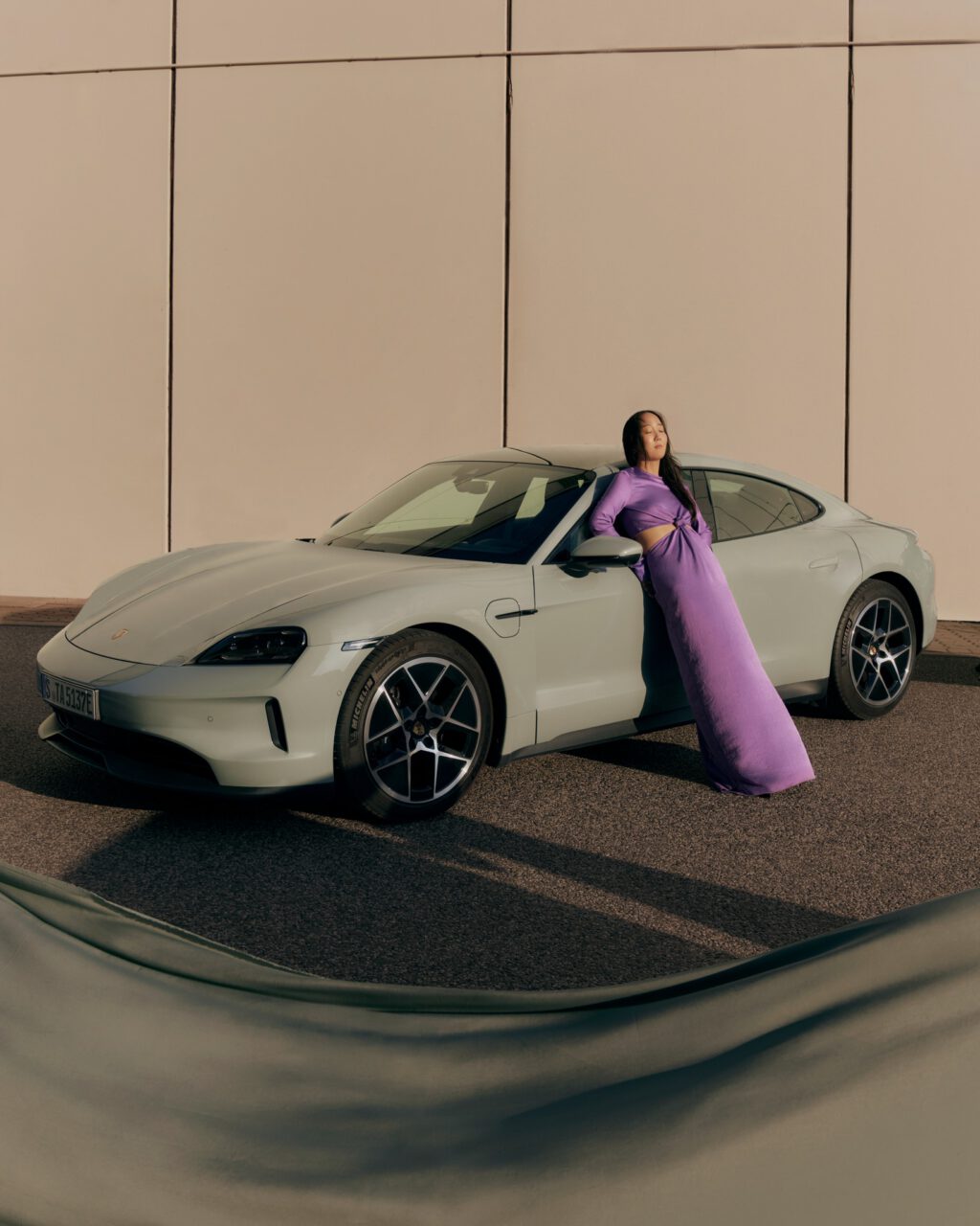 Porsche campaign featuring sleek automotive photography by Paula Nietner and modern styling by Alexandra Heckel. A dynamic showcase of luxury car design and contemporary fashion.