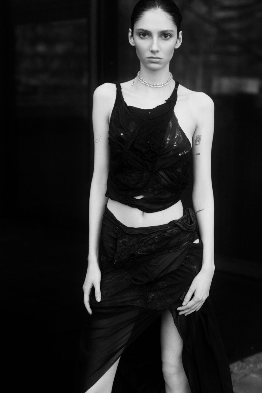 Sophia captured by Max Stürmer and styled by Alexandra Heckel. This editorial highlights innovative fashion choices and creative styling, reflecting a unique blend of contemporary aesthetics