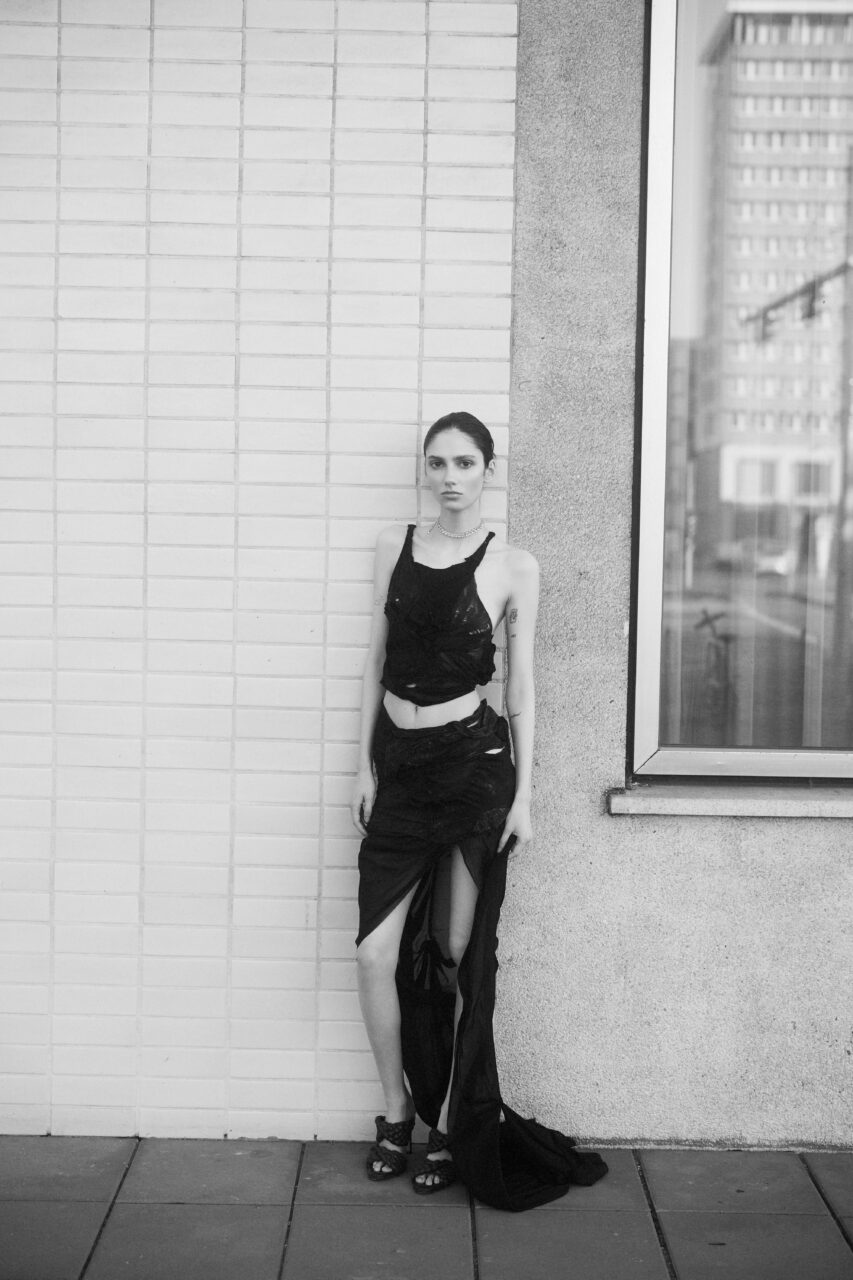 Sophia captured by Max Stürmer and styled by Alexandra Heckel. This editorial highlights innovative fashion choices and creative styling, reflecting a unique blend of contemporary aesthetics