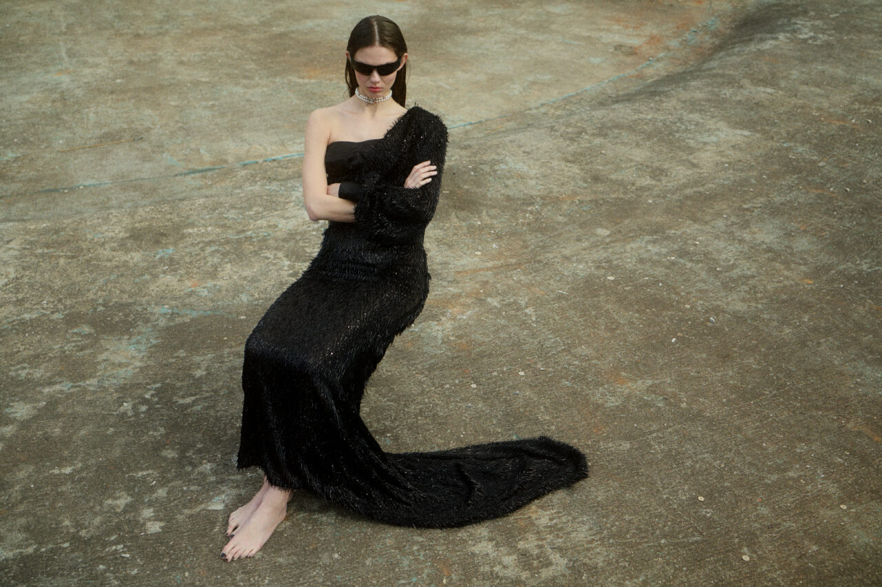 Julia Merkelbach photographed by Max Stürmer with styling by Alexandra Heckel. A contemporary portrait showcasing modern fashion and artistic expression.