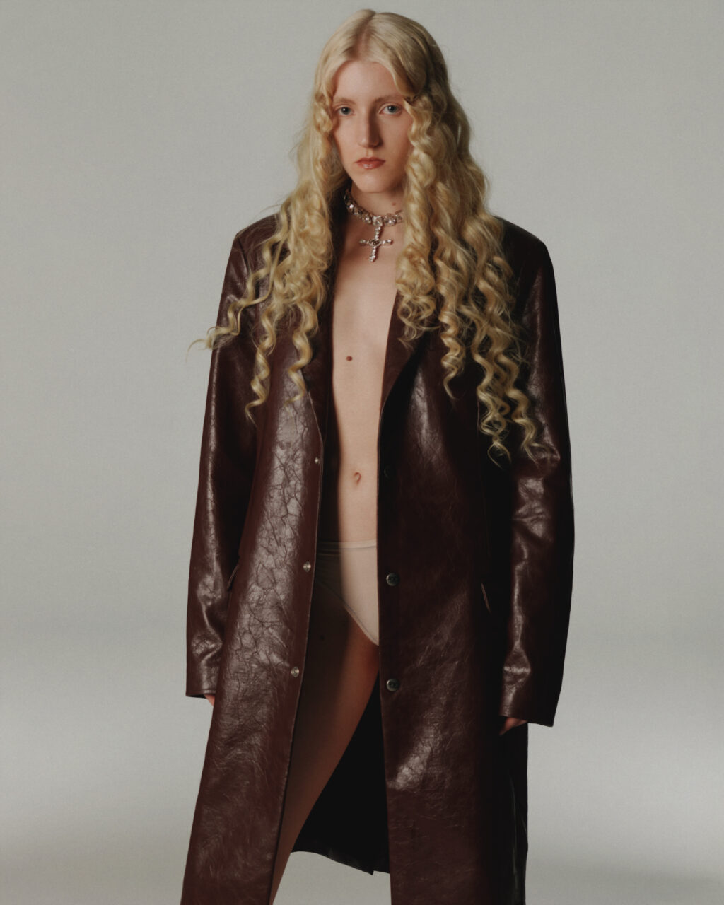 High-fashion editorial spread for SleekVogue Magazine, shot by photographer Yonoo Kim and styled by Alexandra Heckel, featuring contemporary high-end styling.